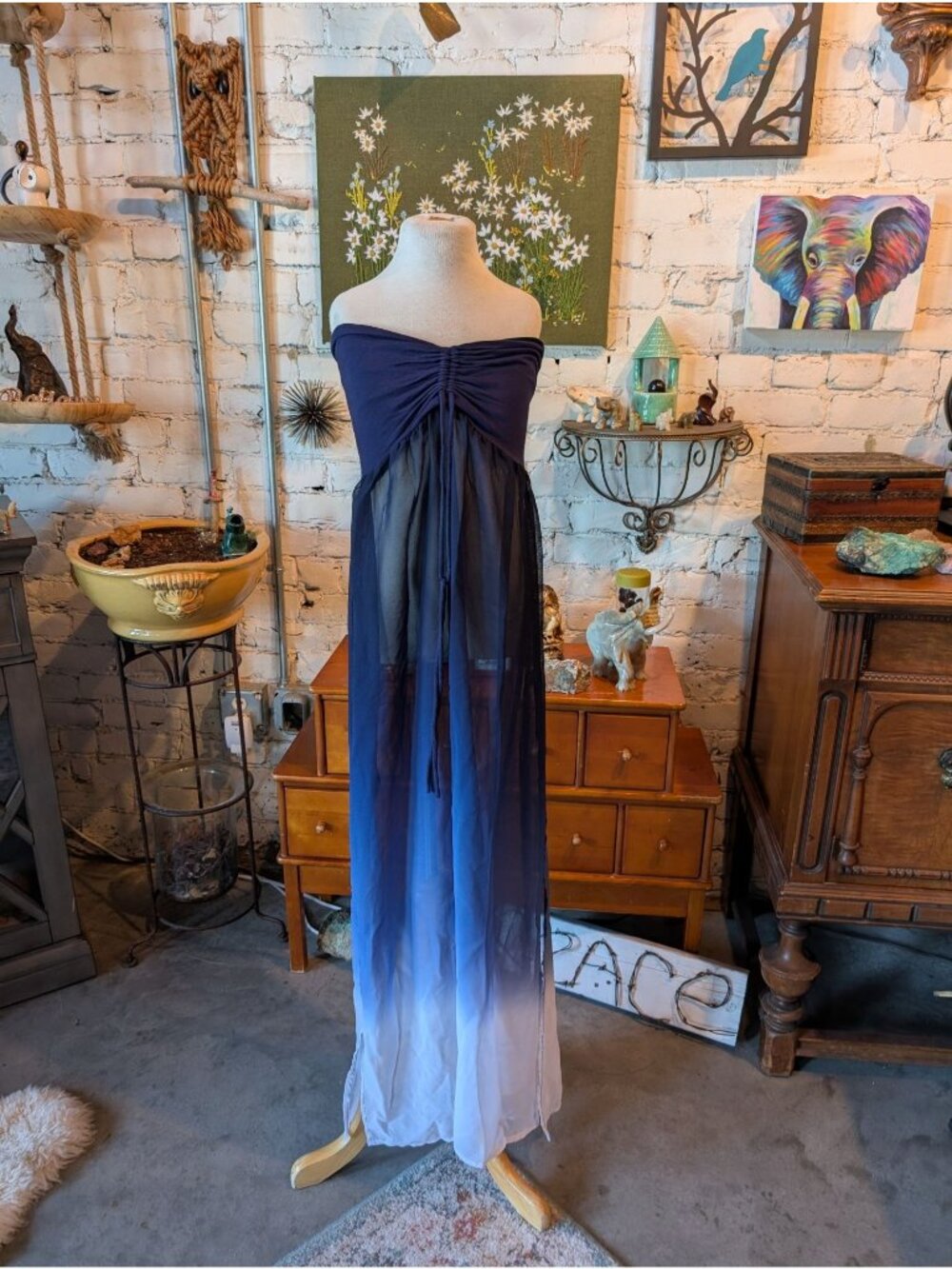 Raviya strapless maxi dress a blue and white ombre color transition.